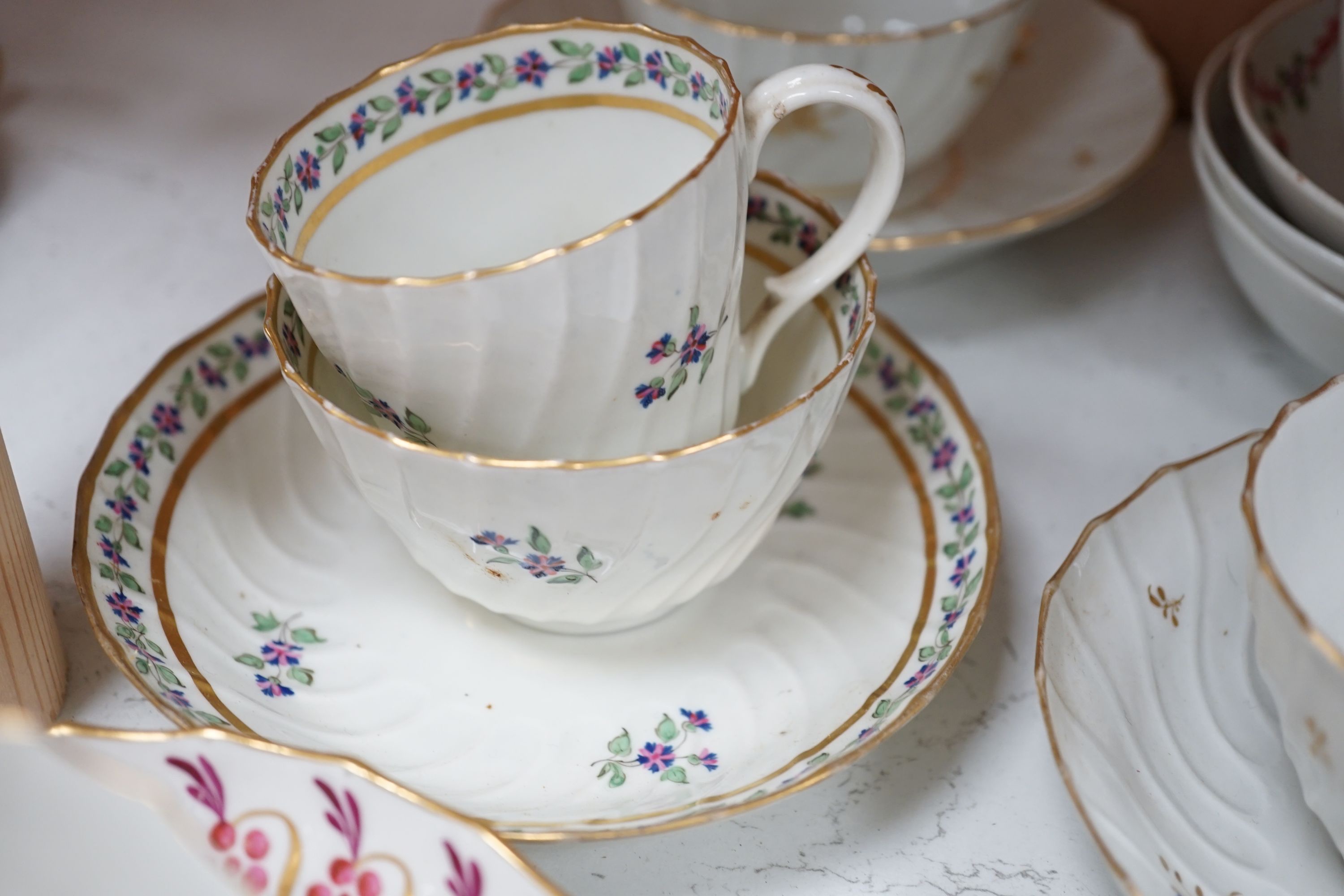 A selection of late 18th/early 19th century English porcelain tea and coffee wares including Worcester and New Hall types